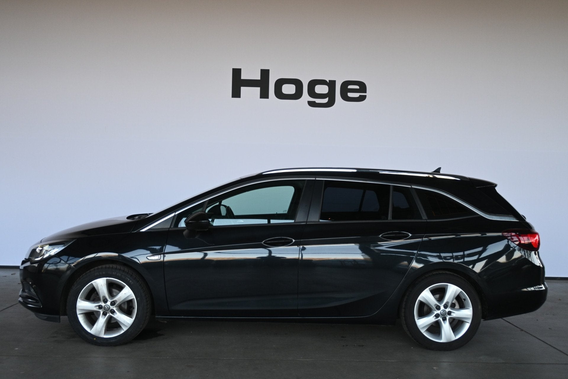 Opel Astra Sports Tourer 1.0 Business+ Clima Navigatie Carpl, Auto's, Stof, Gebruikt, 1178 kg, Met garantie (alle)