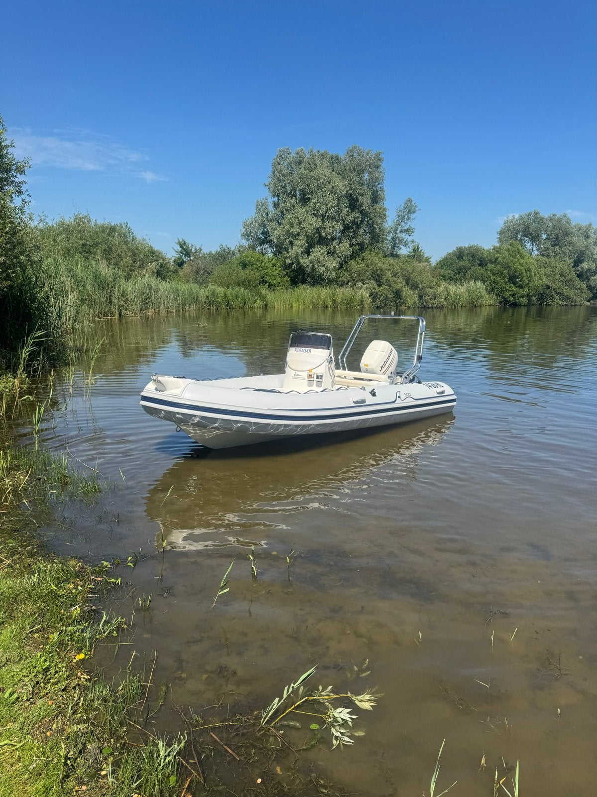 RIB met Johnson 60pk, minitop, koelkast en trailer, Watersport en Boten, Gebruikt, Brandstoftank, Ophalen, Polyester/glasvezel