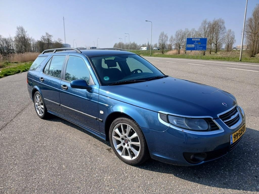 Saab 9-5 2.3 T Sport Estate AUT 2006 Blauw, Auto's, Saab, Stof, 1800 kg, Zwart, 4 cilinders