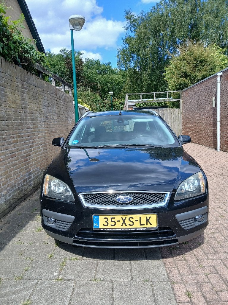 Ford Focus 1.6 74KW Wagon 2007 Zwart apk juli 2027, Auto's, Ford, 1596 cc, 4 cilinders, 635 kg, 100 pk
