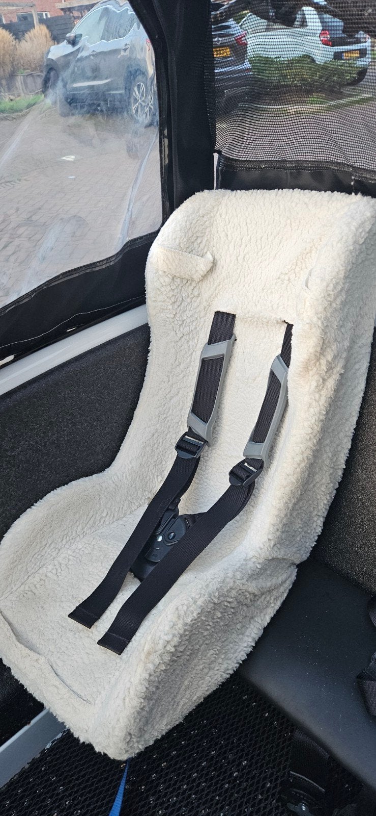 Comfortabel schapenwollen zitje voor bakfiets, Ophalen, Zo goed als nieuw, 9 t/m 18 kg, Achterzitje