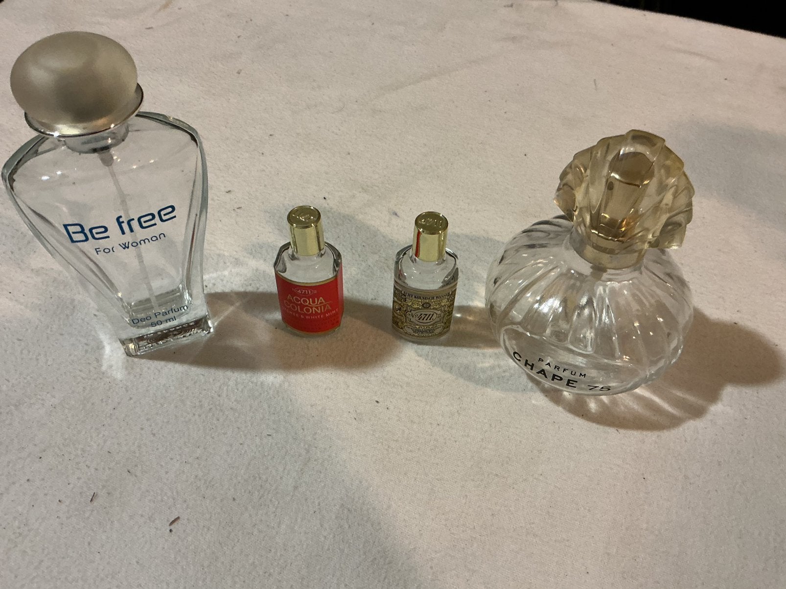 4 parfumflesjes, Verzamelen, Ophalen of Verzenden, Zo goed als nieuw, Miniatuur