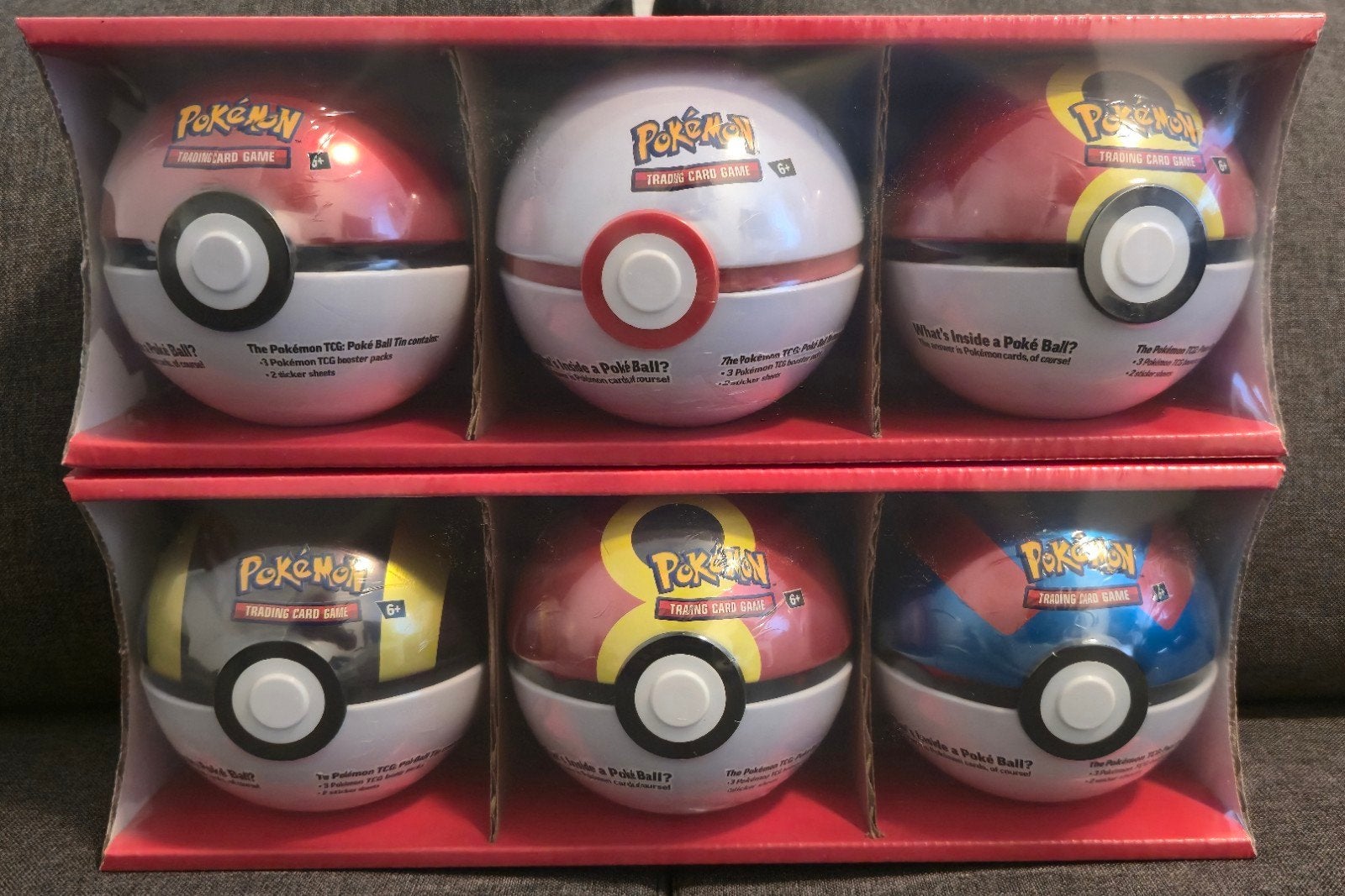 Pokémon TCG Poké Ball Tin 3-Pack 2x, Ophalen of Verzenden, Nieuw, Boosterbox, Foil