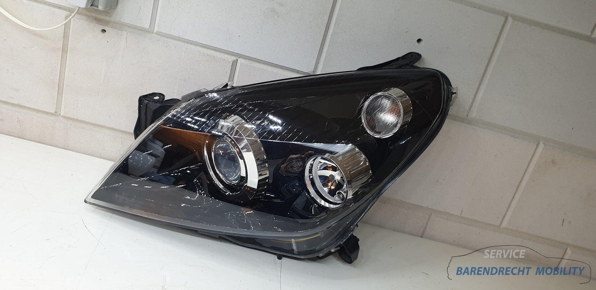 Xenon koplamp Opel Astra H 1EL008700-31 links bestuurderskan, Auto-onderdelen, Gebruikt, Opel Automobile GmbH, Ophalen of Verzenden