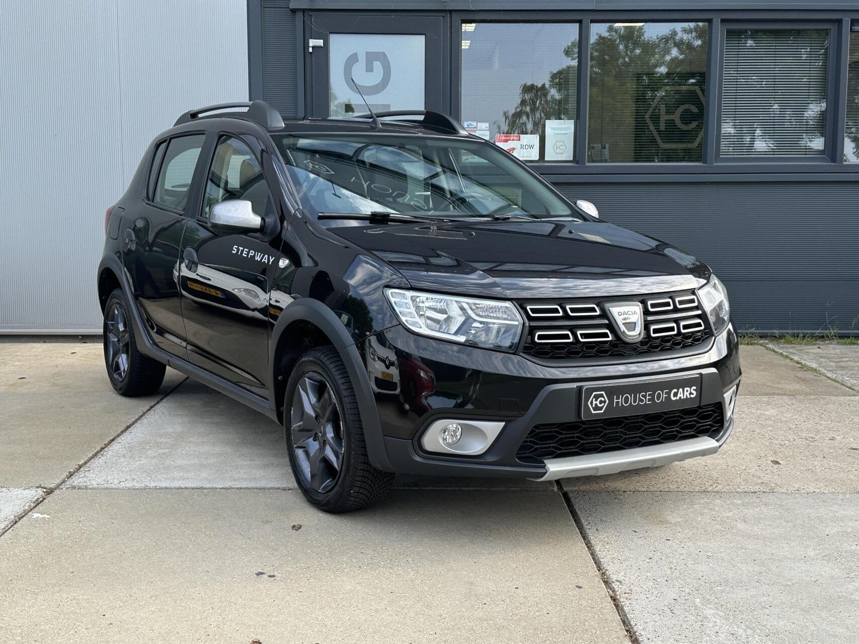 Dacia Sandero 0.9 TCe SL Stepway Airco Cruise Navi LED NAP, Auto's, 898 cc, Leder en Stof, Zwart, Origineel Nederlands