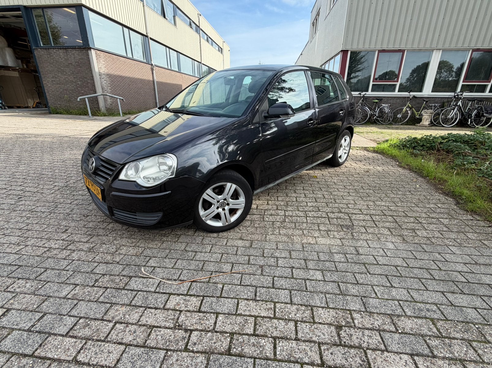 Volkswagen Polo 1.4 55KW 2005 Zwart, Voorwielaandrijving, Dealer onderhouden, 15 km/l, Zwart