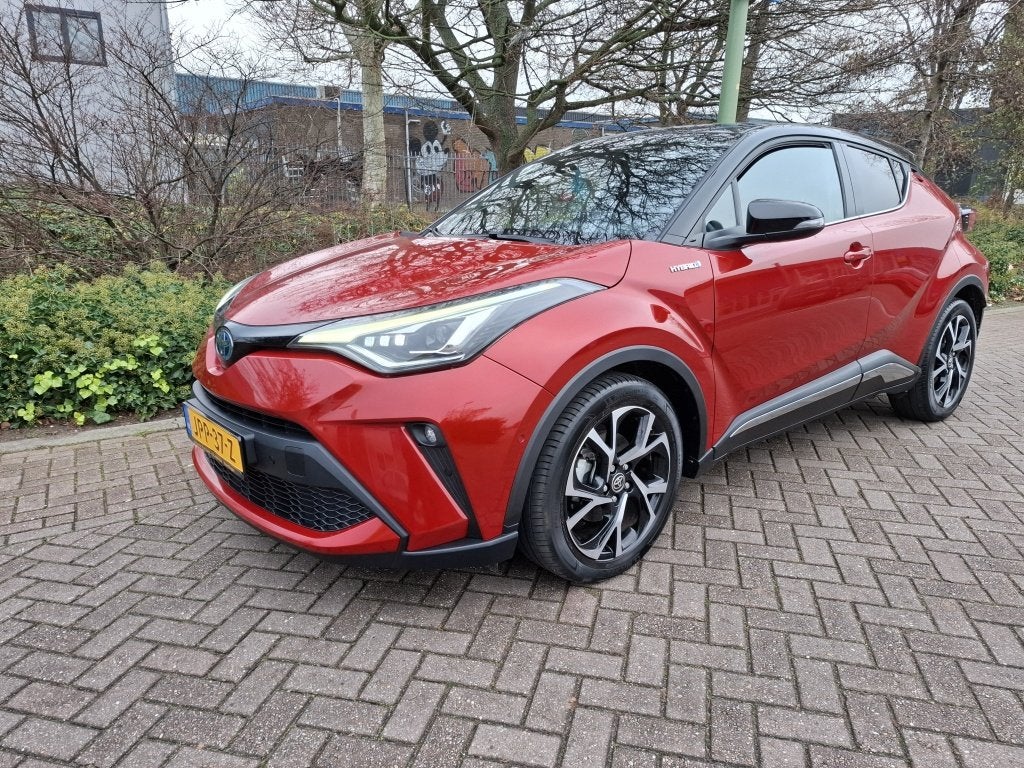 Toyota C-HR 1.8 Hybrid Executive Bi-Tone trekhaak (bj 2022), Auto's, 12 maanden, Euro 6, 4 cilinders, 98 pk