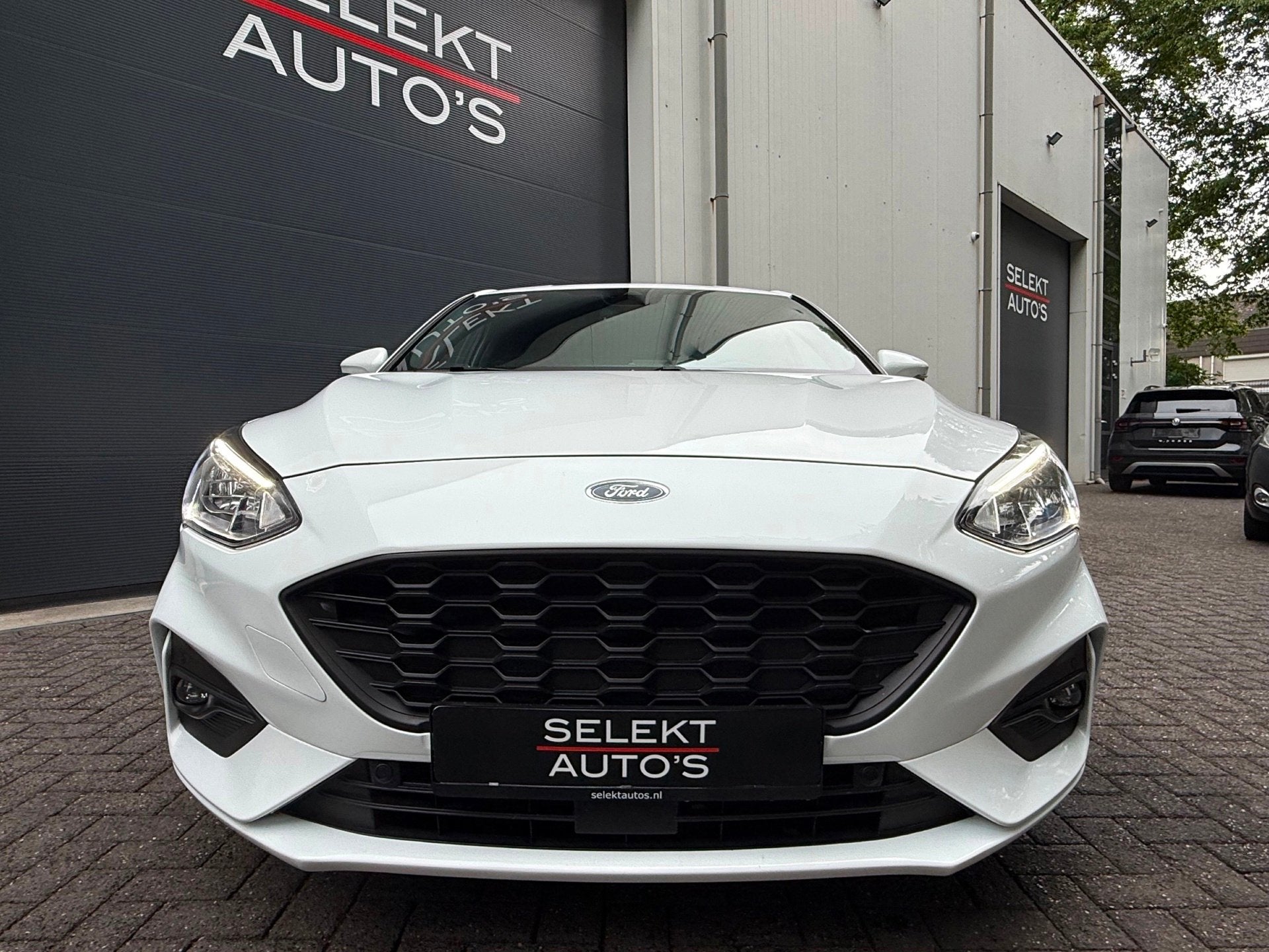 Ford Focus 1.0 EcoBoost ST Line 125 Pk Automaat/Cruise/Clima, Auto's, Ford, Dealer onderhouden, Gebruikt, Zwart, Wit