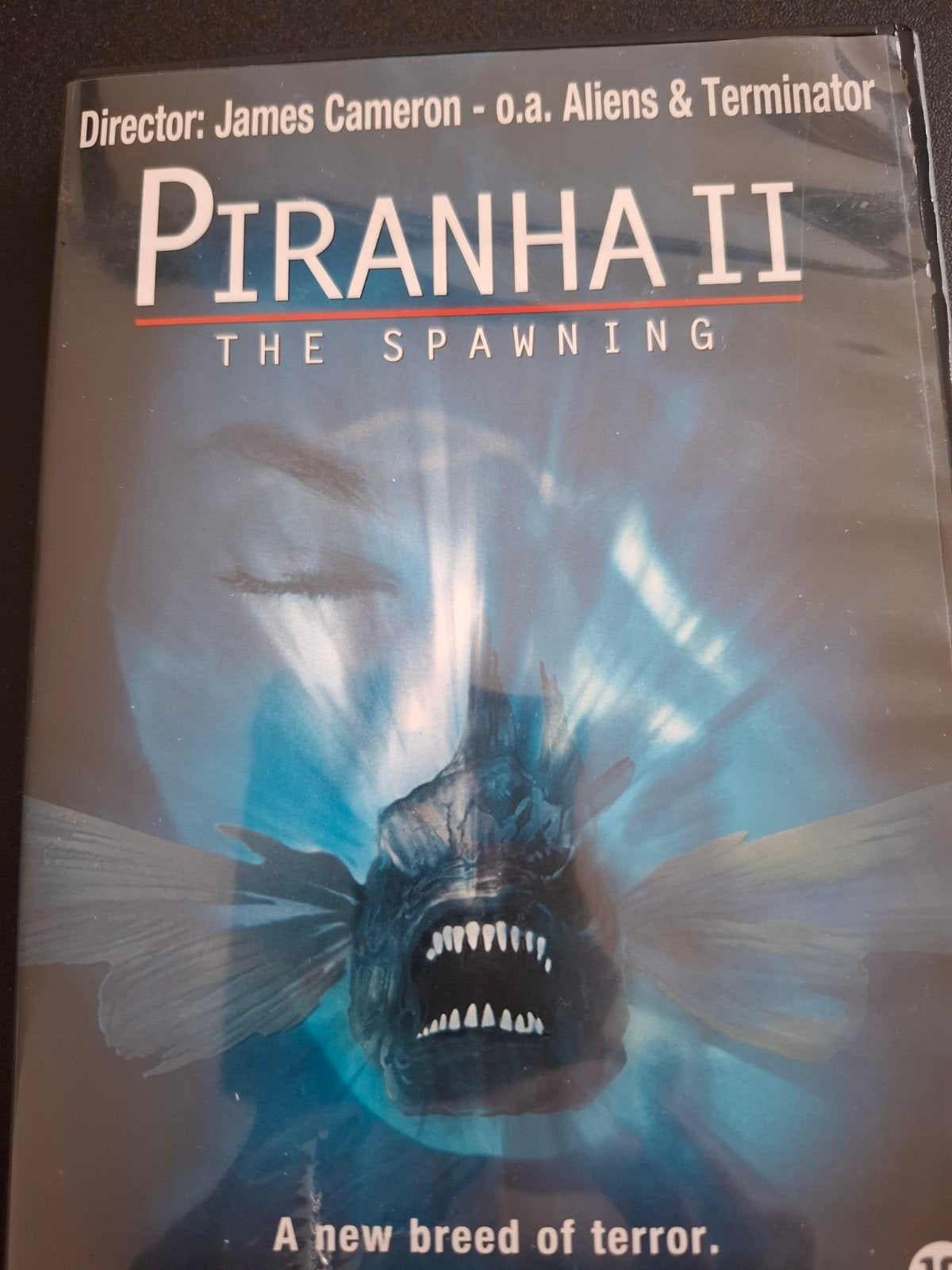 Piranha.The Spawning.16 jaar.€ 2,00 per stuk afname mini 2., Vanaf 16 jaar, Ophalen of Verzenden, Zo goed als nieuw, Overige genres