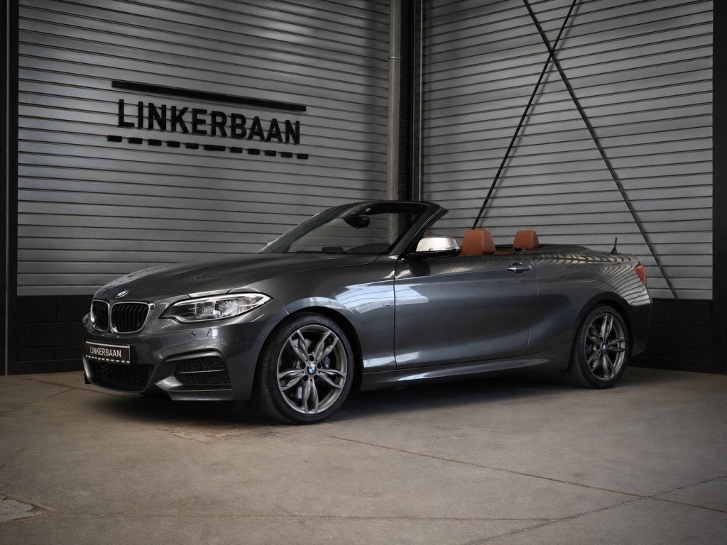BMW 2 Serie Cabrio M235i Cabrio High Executive | Leder | H&K, Auto's, BMW, Gebruikt, Euro 6, 1595 kg, Cabriolet