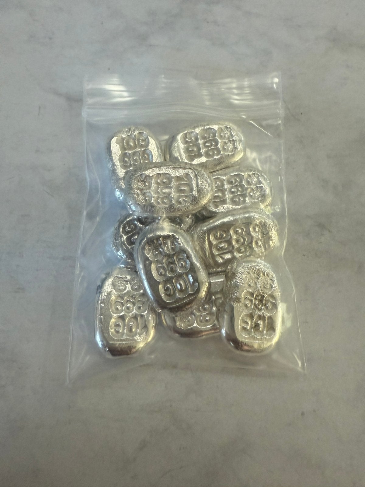 10x 10 gram Zilverbaartjes Skulls / 999 zilver /, Ophalen of Verzenden, Zilver