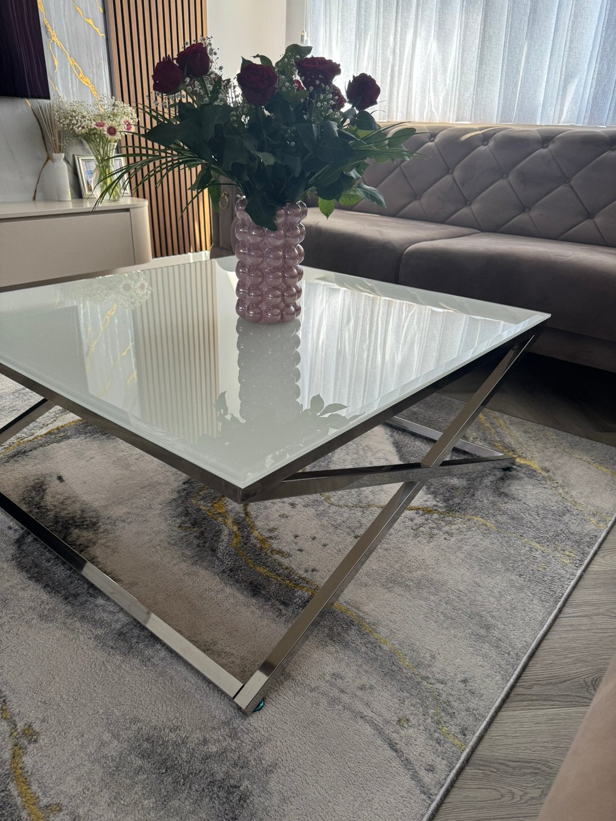 Foto 7 van Moderne salontafel met glazen blad en metalen onderstel
