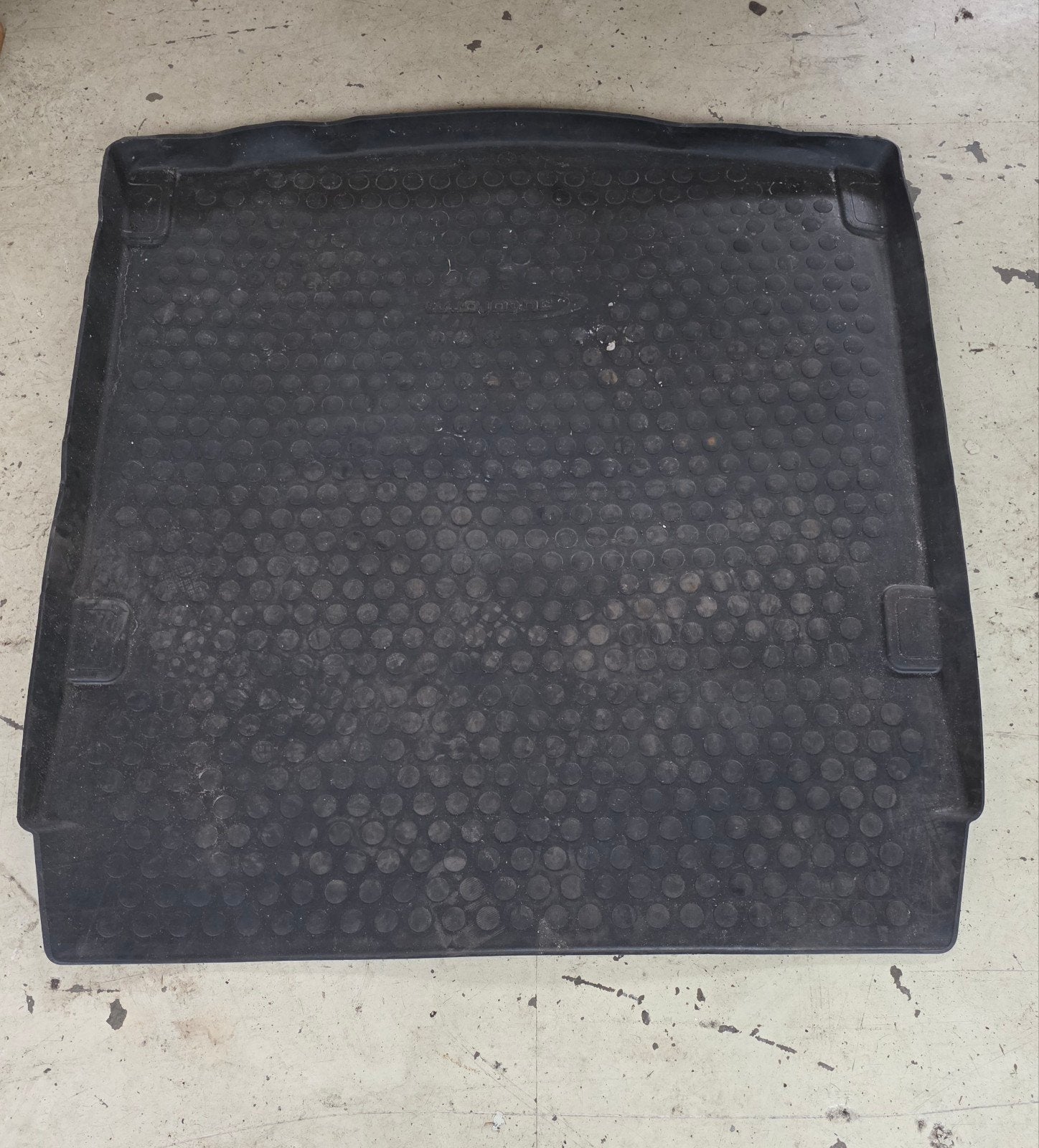 rubberen kofferbakmat, Ophalen