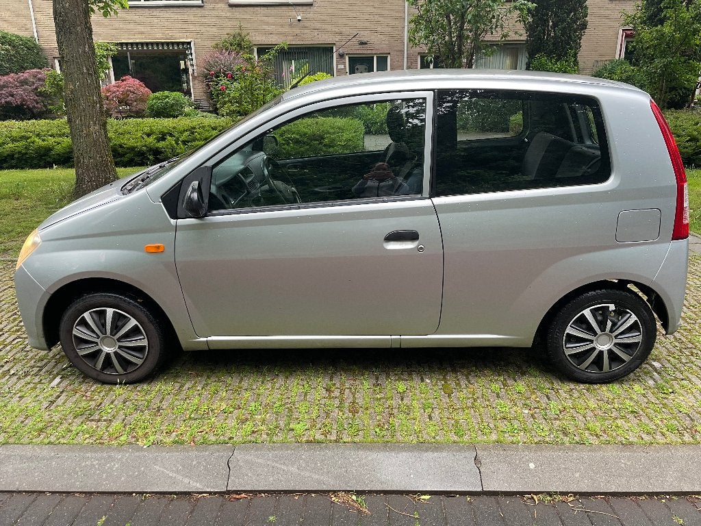 Daihatsu Cuore 1.0 3D 2008 Grijs, Auto's, Dealer onderhouden, Stof, 600 kg, Zwart