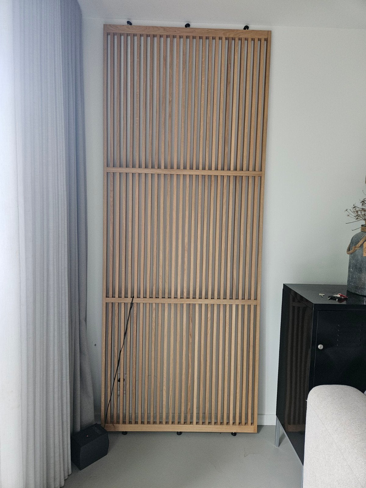 Roomdivider (merk Houtenroomdivider), Ophalen
