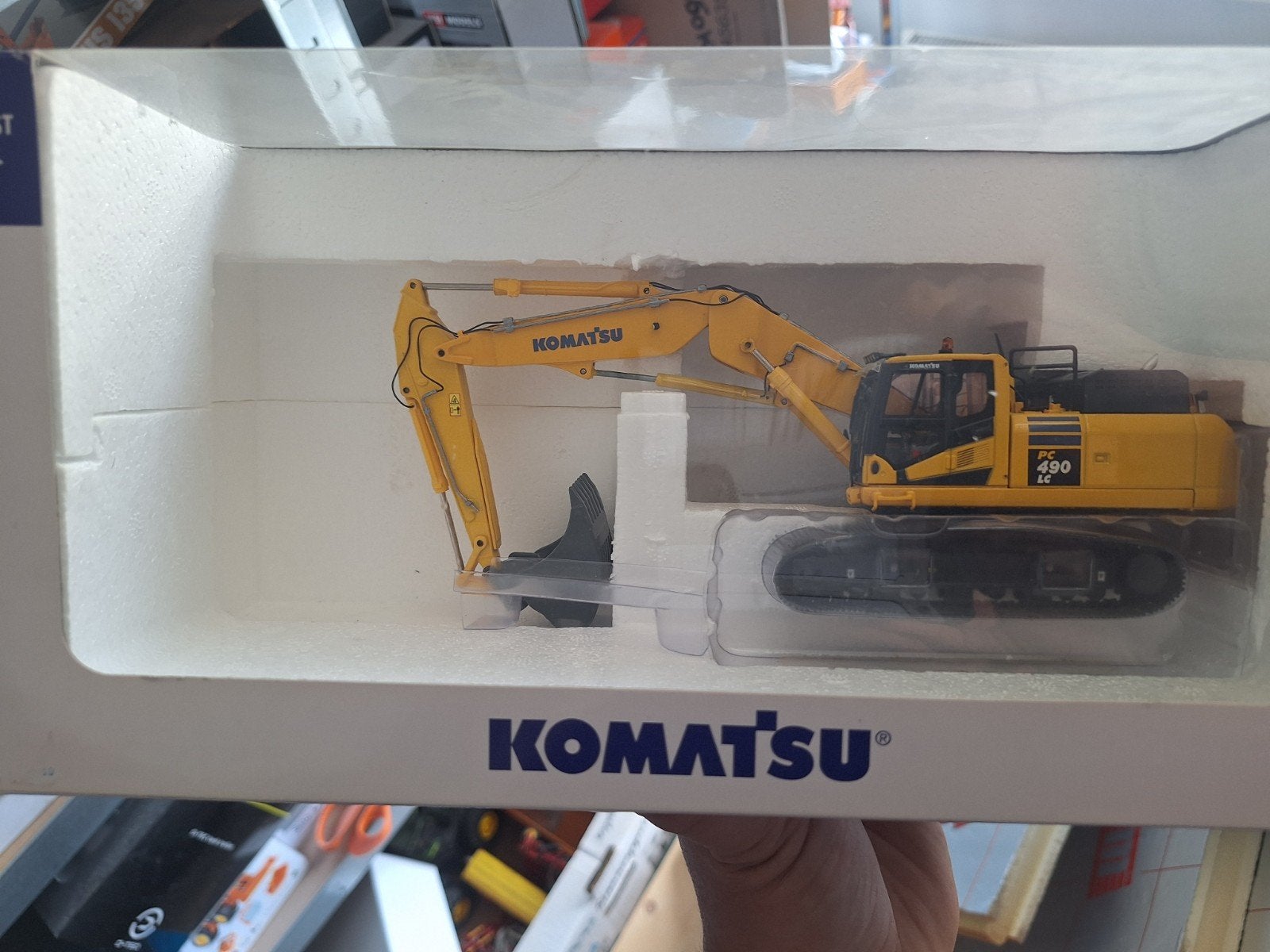 Komatsu PC490 met stelgiek, Ophalen of Verzenden, Bus of Vrachtwagen