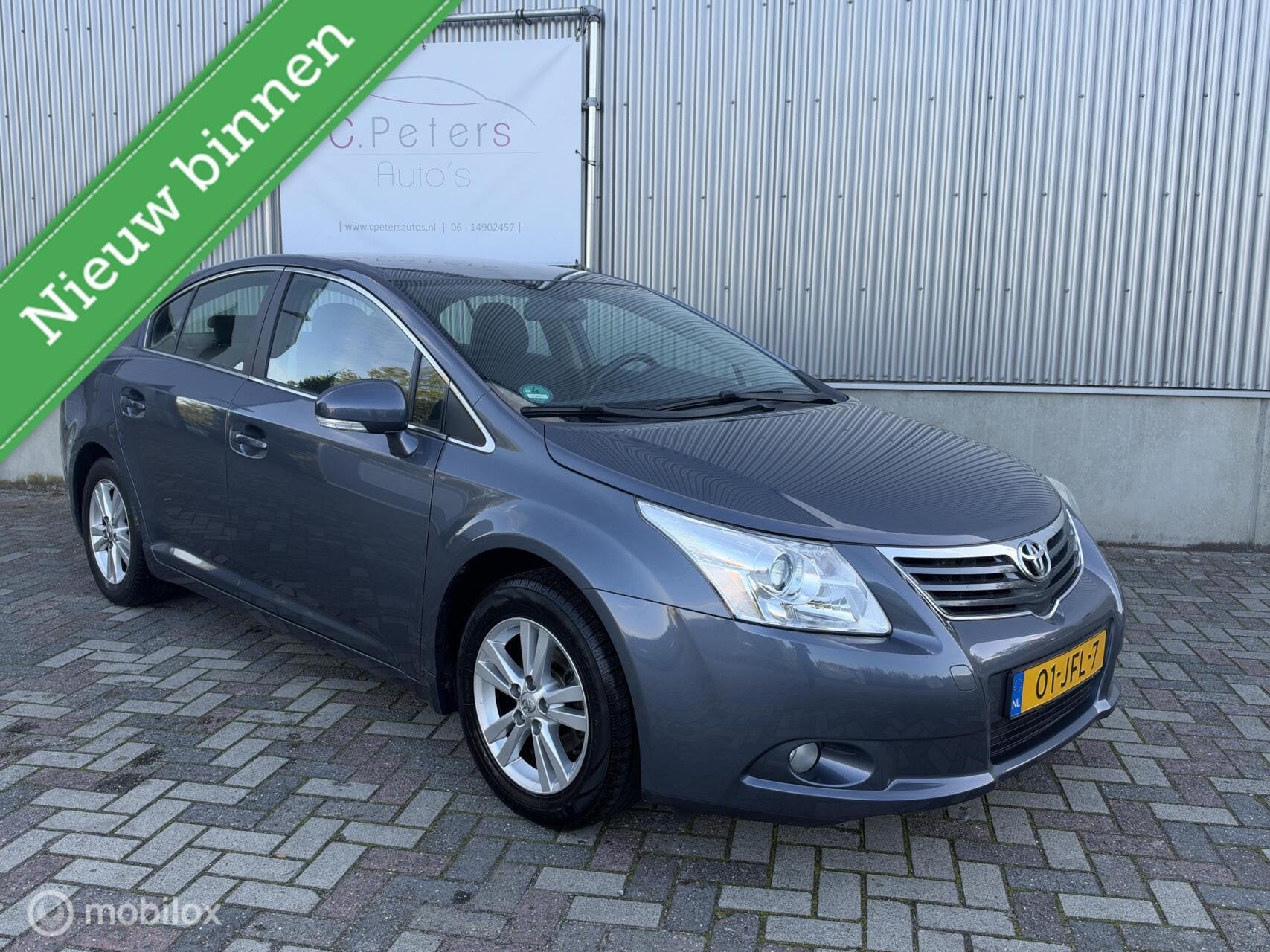 Toyota Avensis 1.8 VVTi Dynamic 2009 / Navigatie / Cruisecon, Auto's, Voorwielaandrijving, Blauw, Origineel Nederlands, Bedrijf