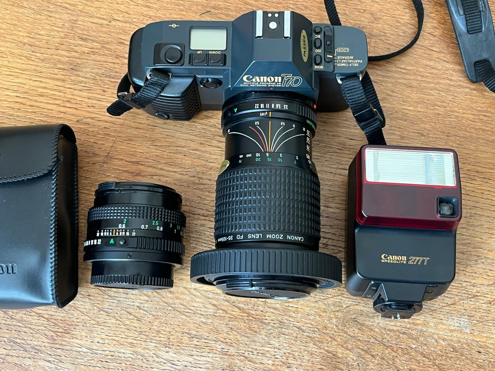 Canon T70 Spiegelreflexcamera set met 2 lenzen en flitser, Ophalen of Verzenden, Gebruikt, Spiegelreflex, Canon