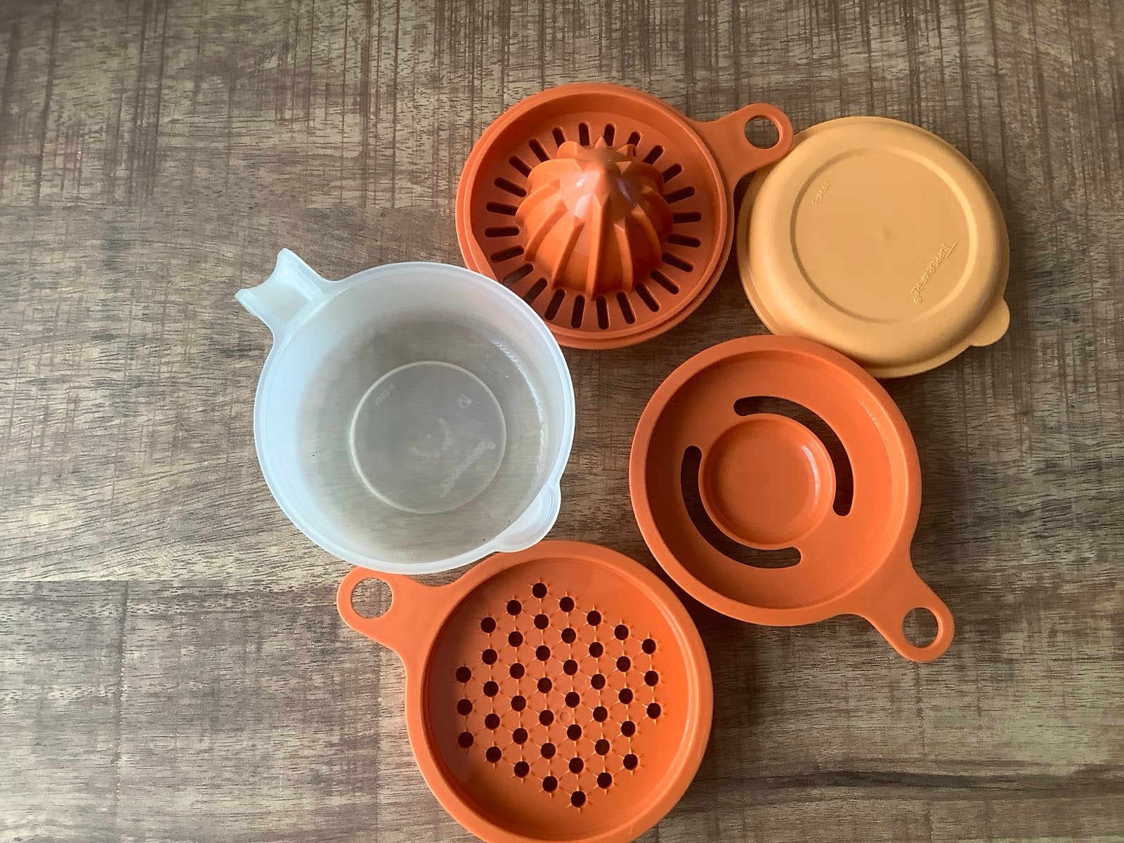 Tupperware citruspers en eierscheider set, Gebruikt, Overige typen, Oranje, Ophalen of Verzenden