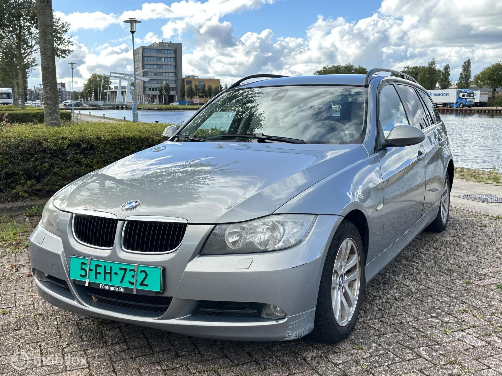 BMW 320i Touring 150PK | 6-Bak | Leder | PDC, Auto's, Achterwielaandrijving, 4 cilinders, 150 pk, Blauw