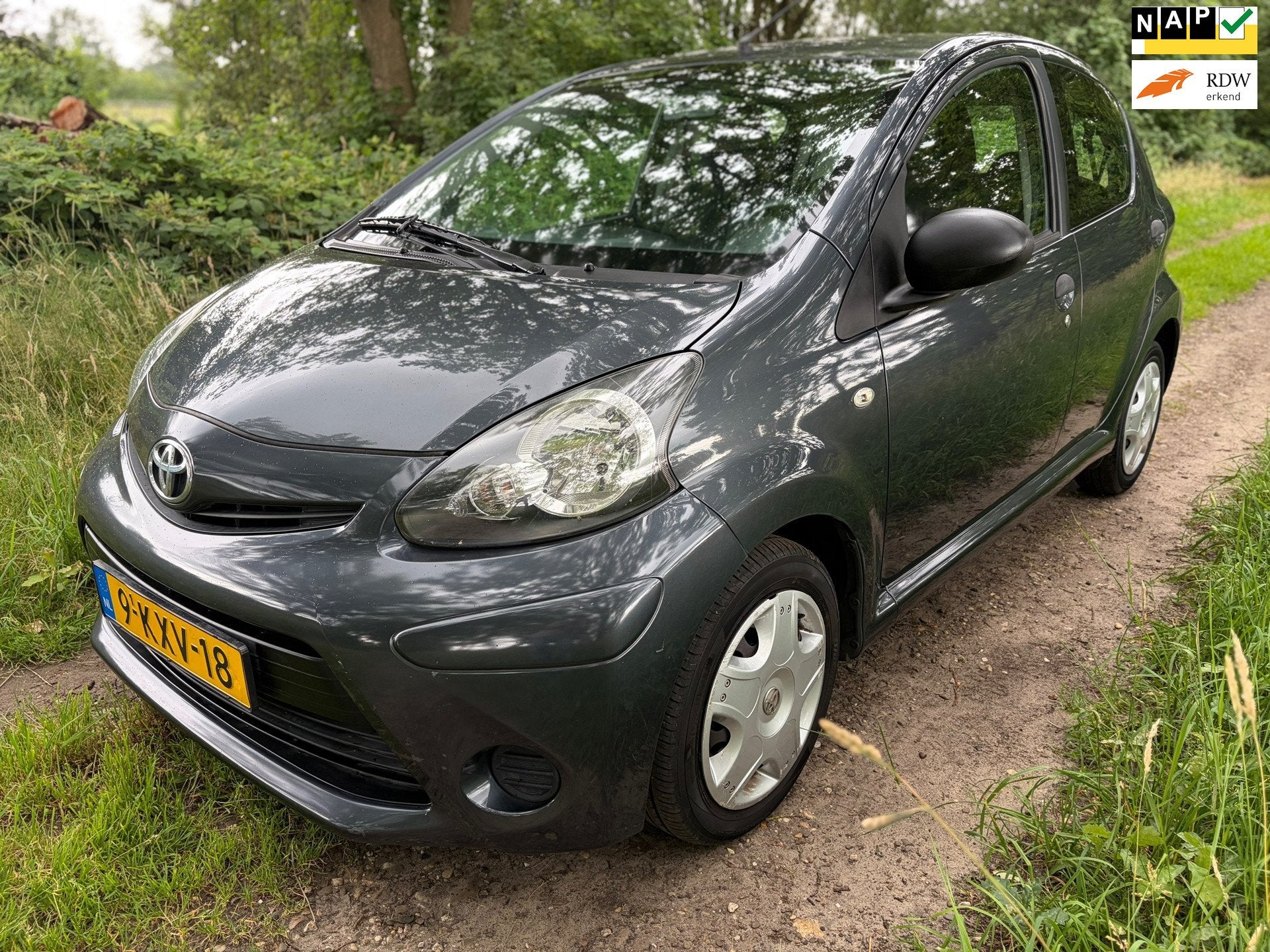 Toyota Aygo 1.0 VVT-i Now Dealer ondh/2e Eig/Airco/E.ramen/N, Euro 5, Stof, Gebruikt, Zwart