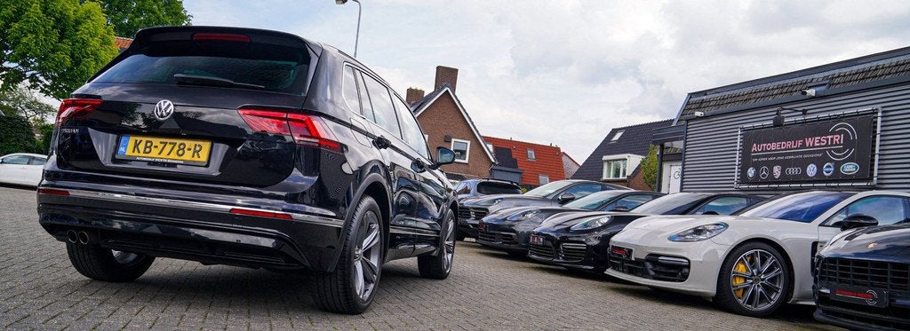 Volkswagen Tiguan 1.4 TSI ACT Comfortline | Massage | Stoelv, Auto's, Stof, 4 cilinders, 150 pk, Zwart