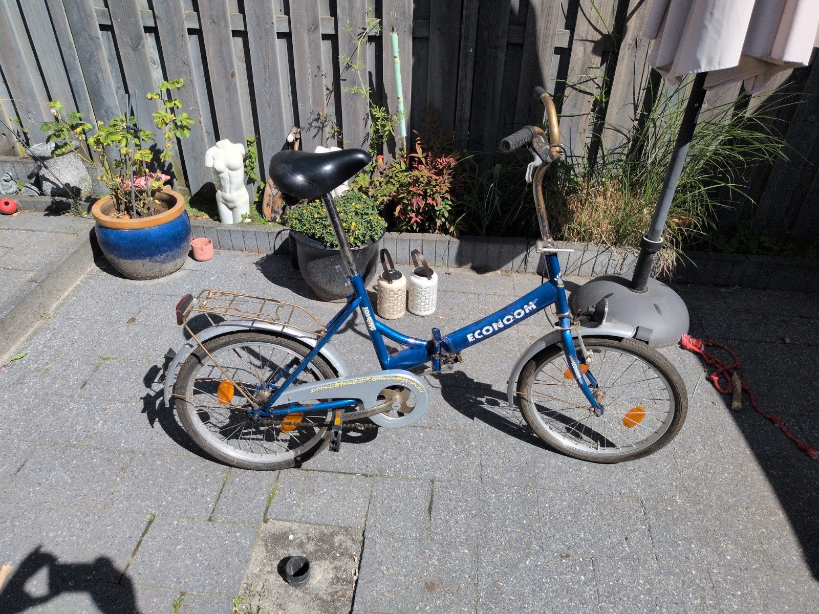 Vouwfiets 'econoom', Fietsen en Brommers, Fietsen | Vouwfietsen, Ophalen, Gebruikt, Deels opvouwbaar, Terugtraprem