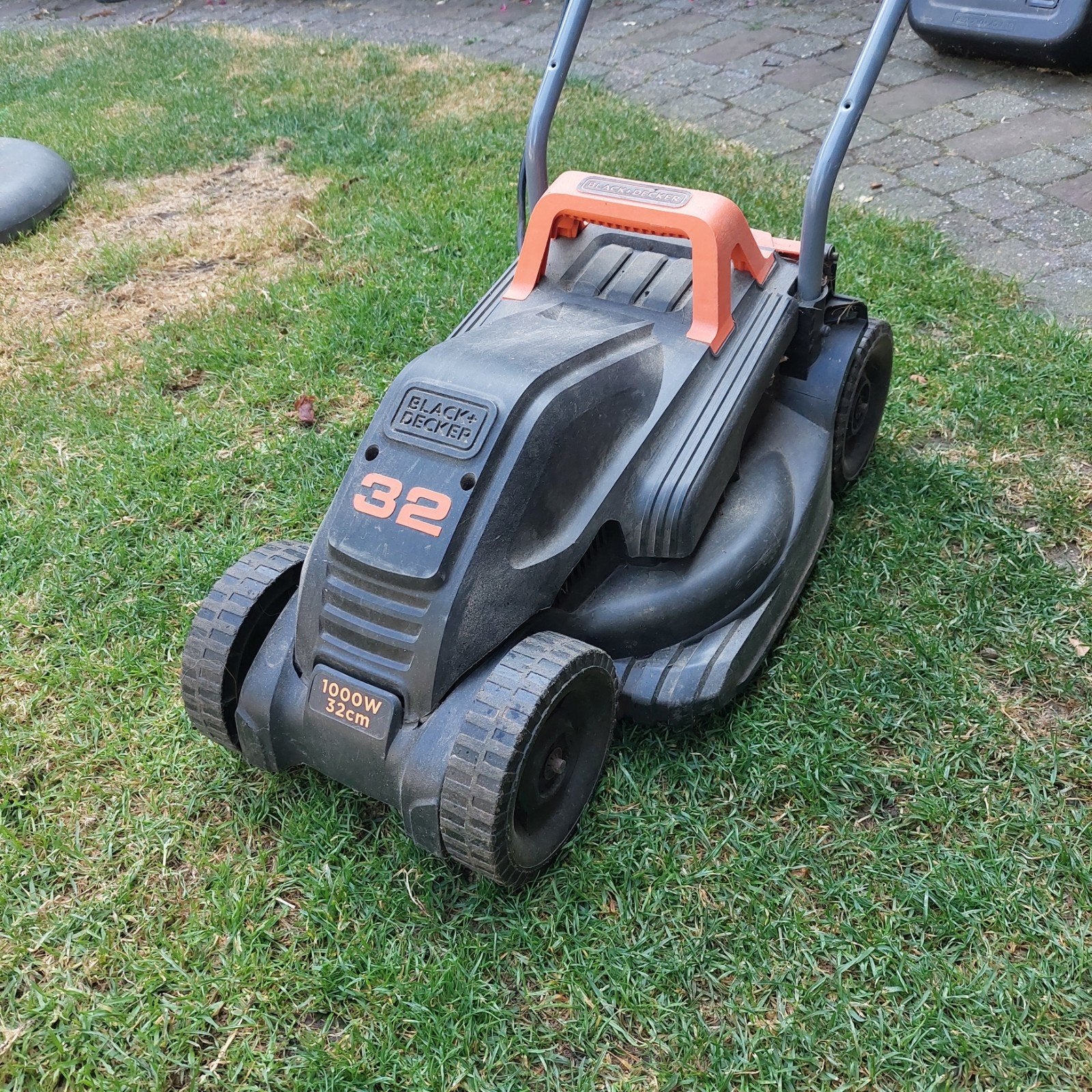 Electrische grasmachine van Black & Decker., Ophalen