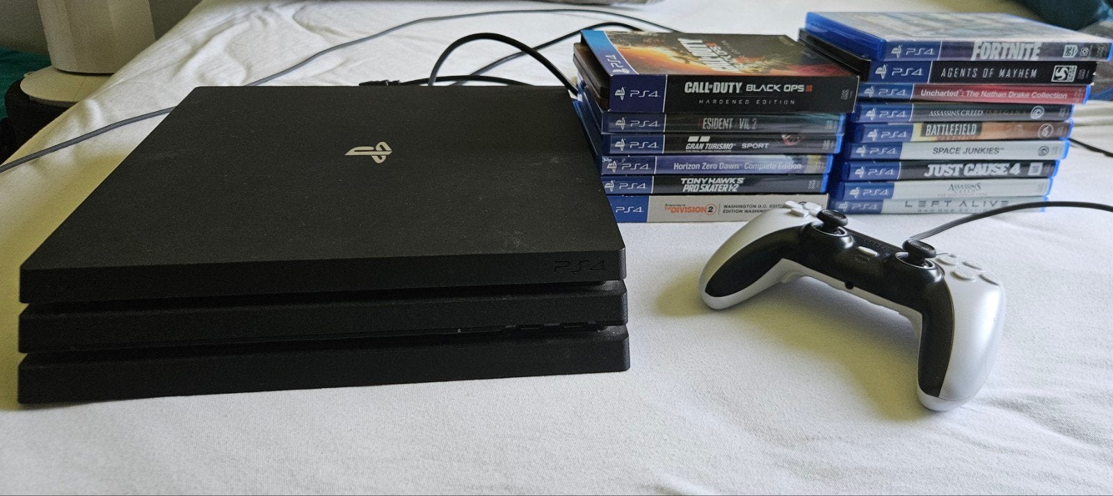 PS4 Pro 1TB met games, steelbooks en lenticular case, Ophalen of Verzenden, 1 TB, Met 1 controller, Pro