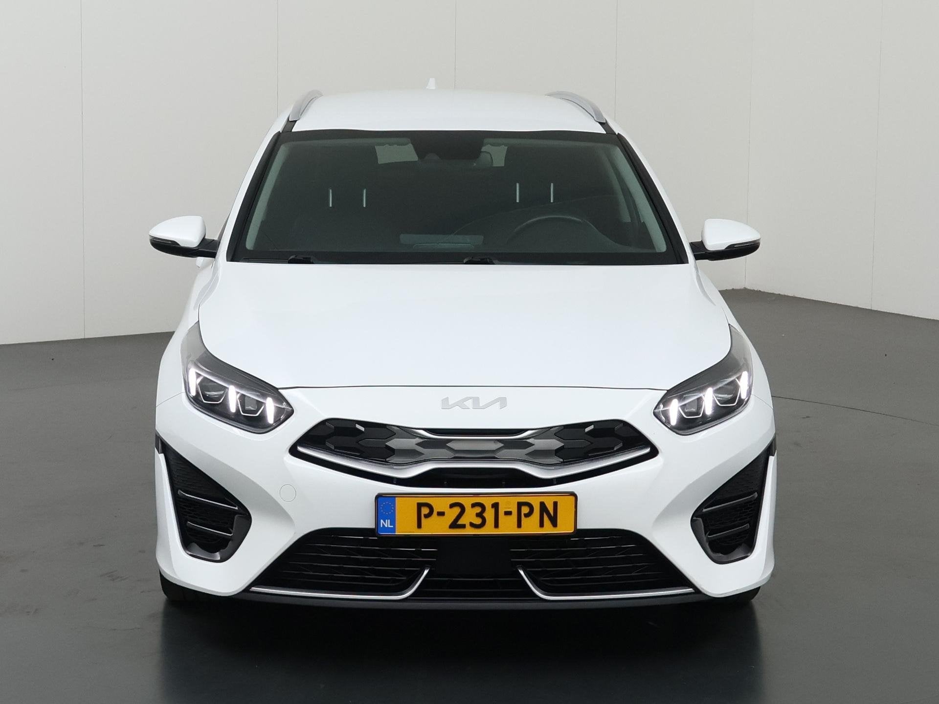 Kia Ceed Sportswagon 1.6 GDI PHEV DynamicPlusLine | Trekhaak, Gebruikt, Leder en Stof, Wit, 1508 kg