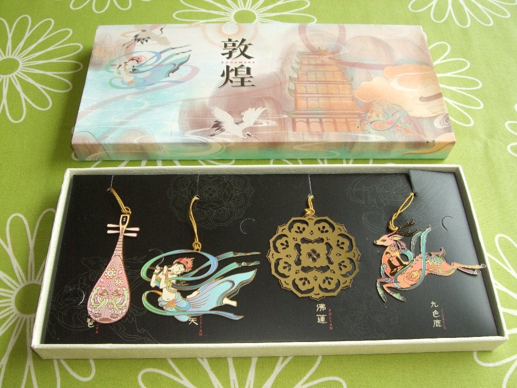 Set van 4 Chinese boekenleggers - mooie kunstwerkjes, Ophalen of Verzenden, Zo goed als nieuw, Overige onderwerpen