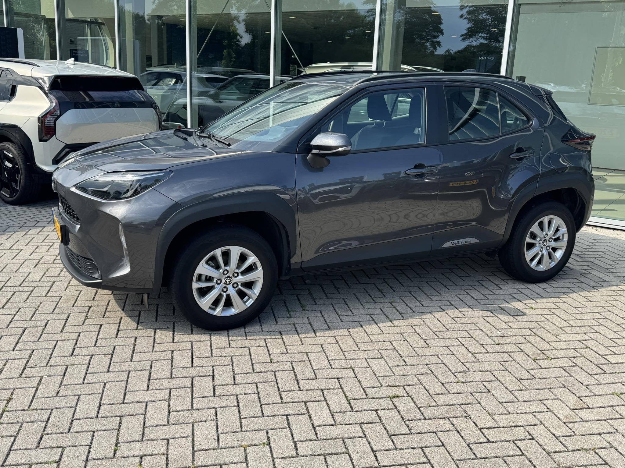 Toyota Yaris Cross 1.5 Hybrid 115 Active, Auto's, Stof, Gebruikt, 1165 kg, 116 pk