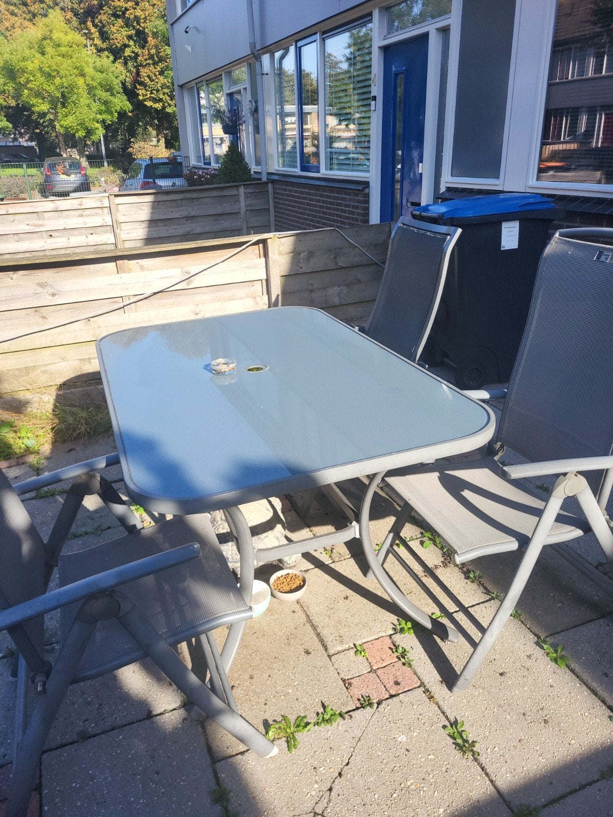 Rechthoekige tafel met 4 stoelen en parasolvoet., Tuin en Terras, Ophalen, Gebruikt, Rechthoekig, Metaal