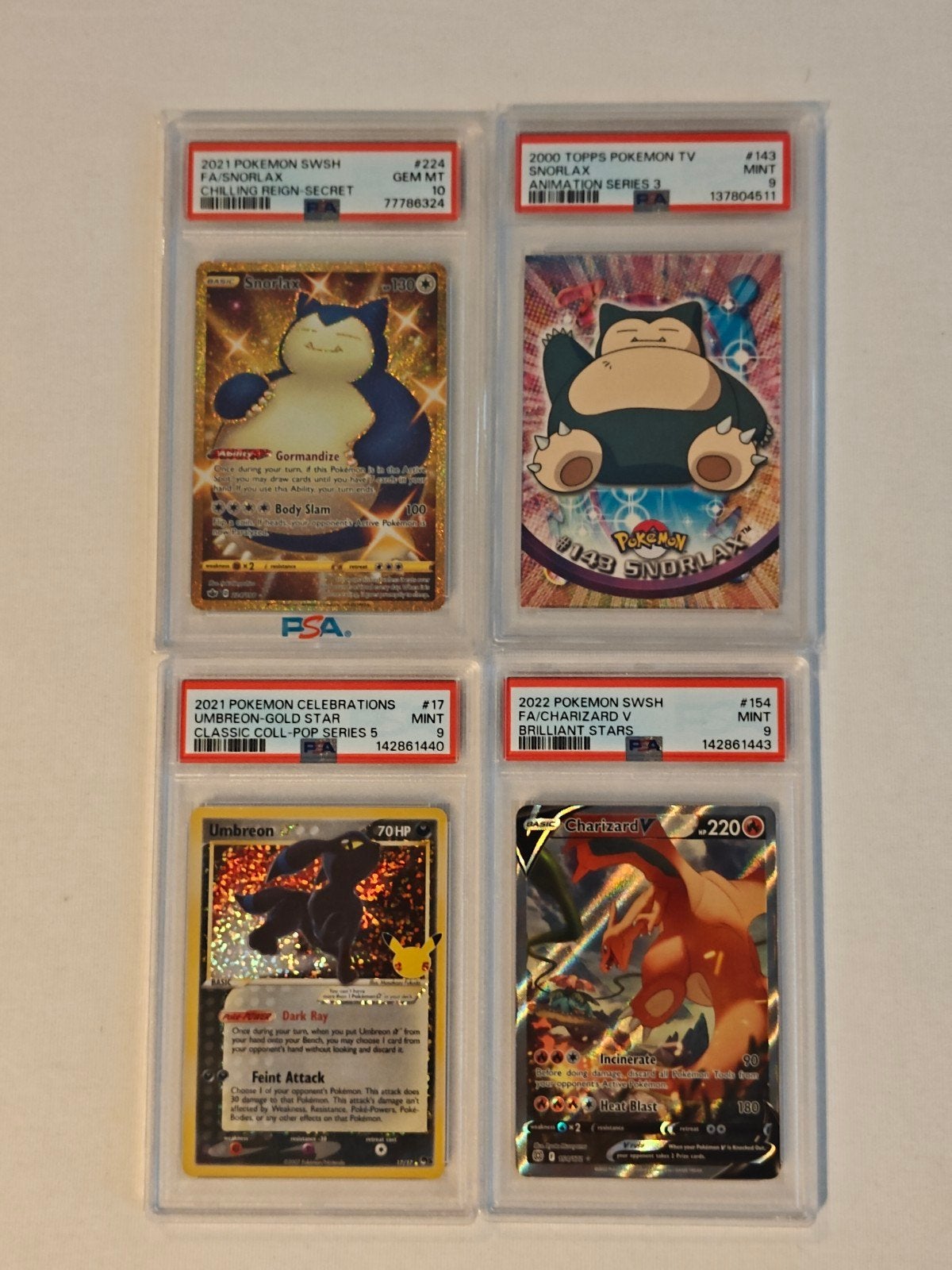 PSA Graded Pokémon Kaarten: Umbreon, Charizard, Ophalen, Zo goed als nieuw, Meerdere kaarten