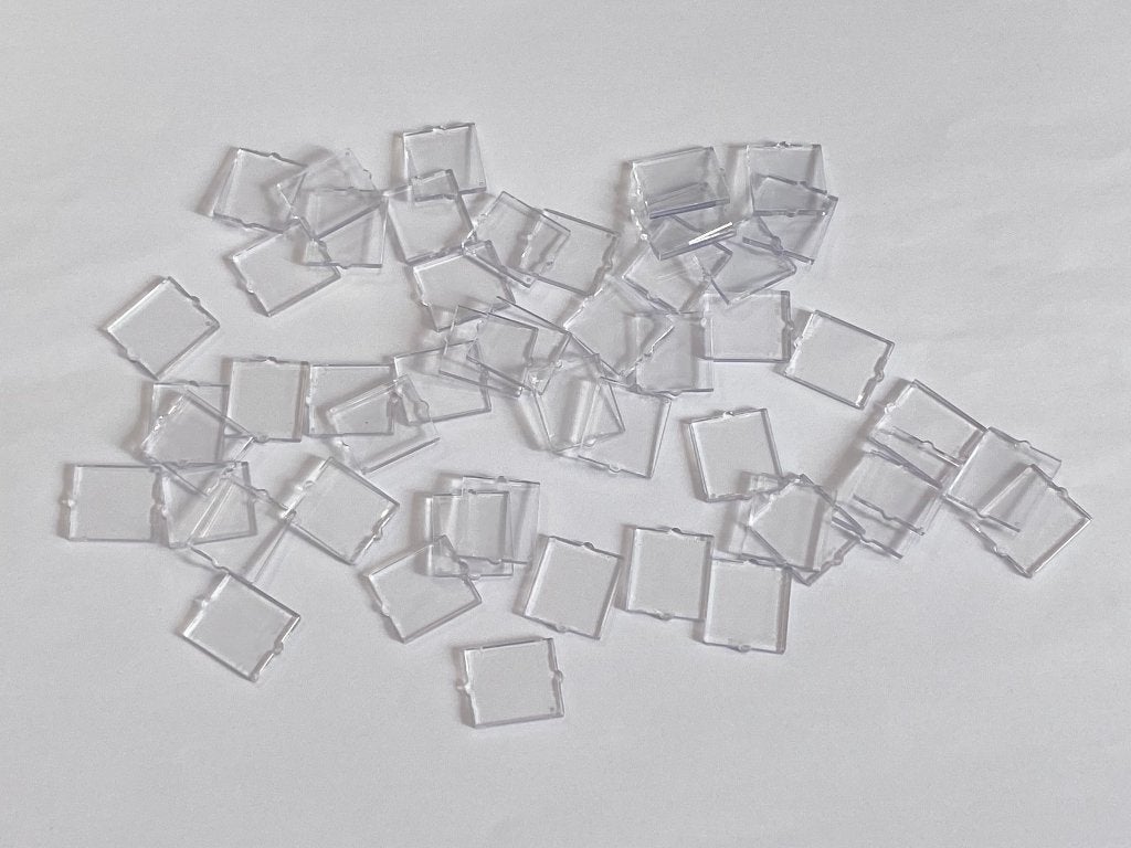 Partij 50x nieuwe 1x2x2 Lego ramen/glas in diverese kleuren