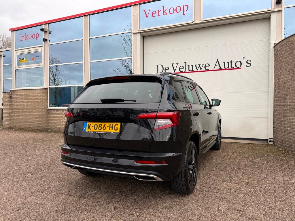 Skoda Karoq 1.5 TSI ACT Sportline Business|PANO|LED|ACC|, Auto's, Skoda, Stof, 4 cilinders, 150 pk, Zwart