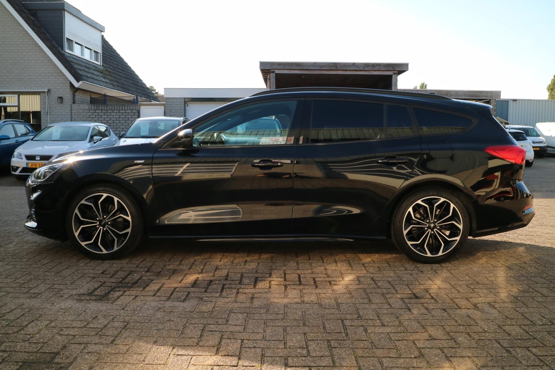 Ford Focus Wagon 1.5 EcoBoost ST Line | Navi | Camera | Auto, 1345 kg, Stof, 150 pk, Zwart