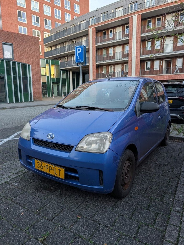 Daihatsu Cuore 1.0 3D 2004 Blauw, Auto's, 600 kg, 18 €/maand, Cuore, Origineel Nederlands