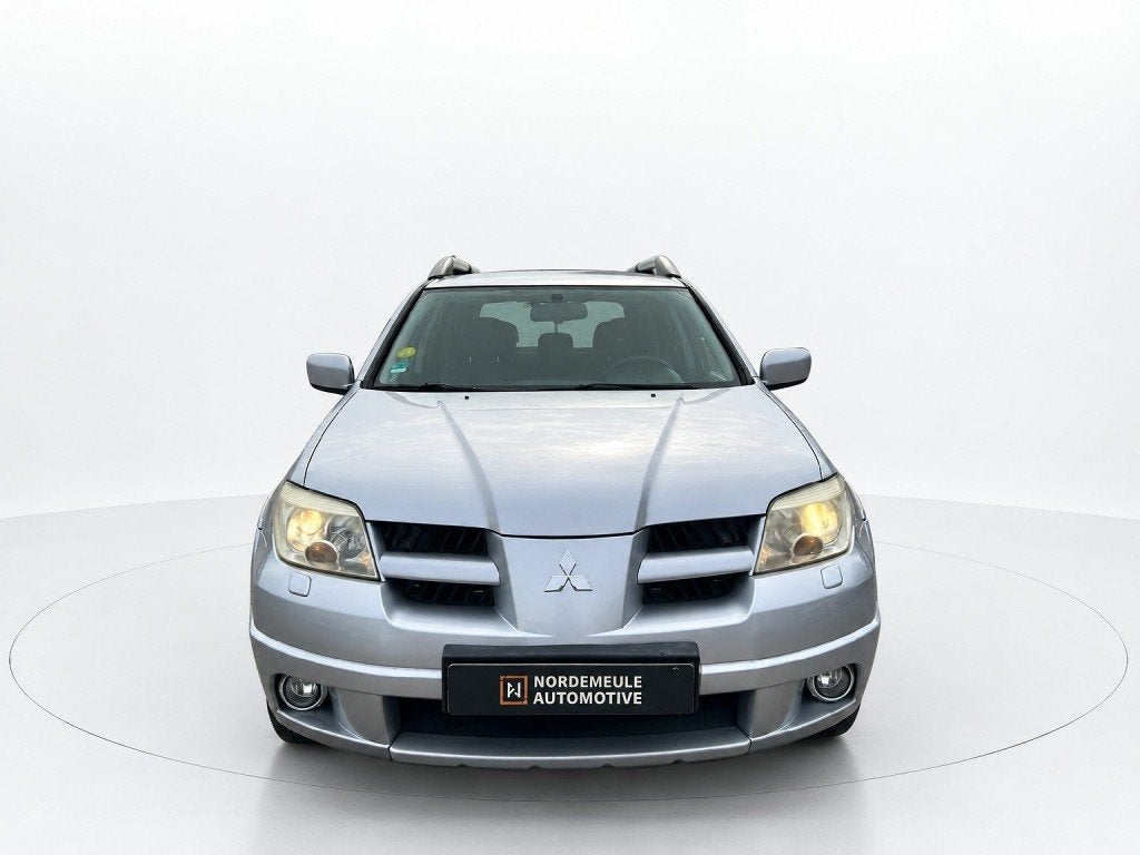 Mitsubishi OUTLANDER 2.4 SCOTT 4WD, Cruise, AUT, Trekhaak, Auto's, Automaat, 4 cilinders, Bedrijf, 161 pk