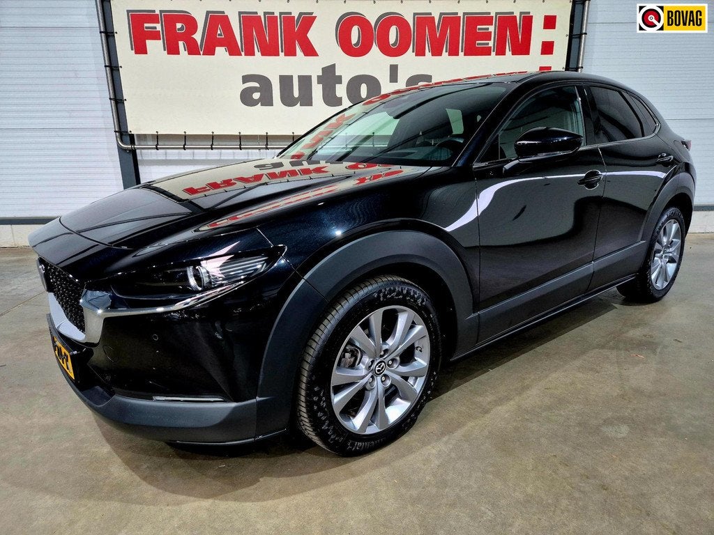 Mazda CX-30 2.0 e-SkyActiv-G 150PK M Hybrid Homura + LED|Key, Auto's, Mazda, Stof, Gebruikt, 4 cilinders, Bedrijf