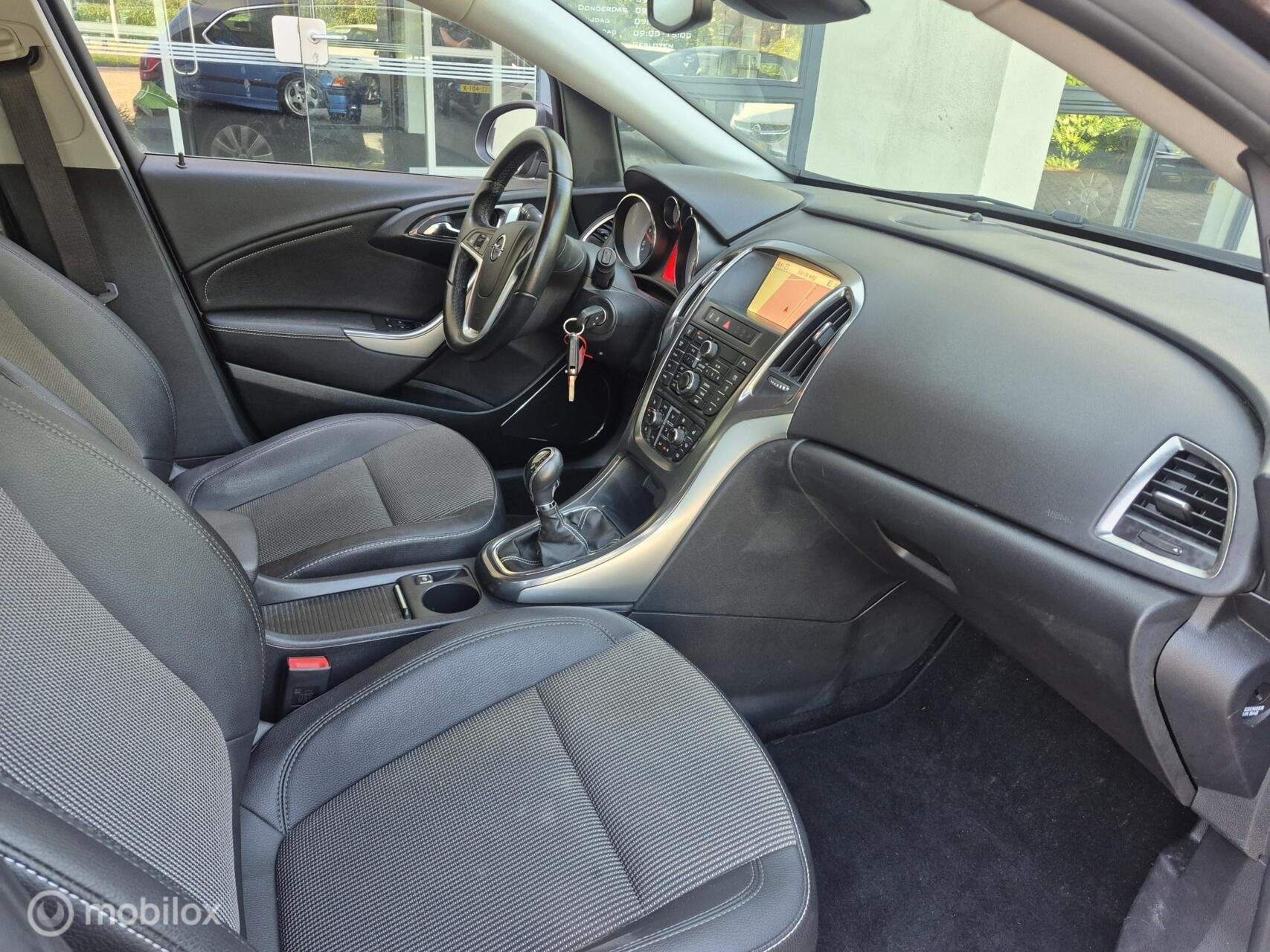 Opel Astra Sports Tourer 1.4 Turbo Cosmo|Clima|Cruise|Navi!, Auto's, Voorwielaandrijving, Euro 5, 4 cilinders, Leder en Stof