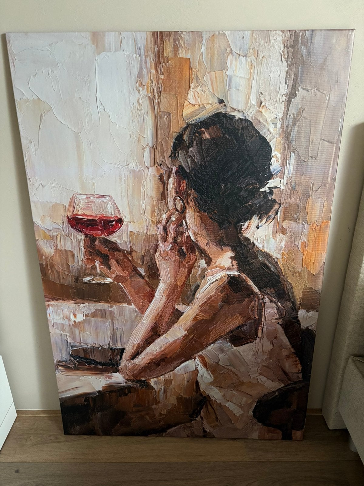 Schilderij vrouw met wijn, Ophalen