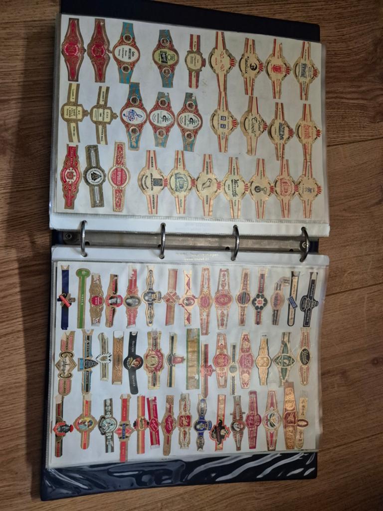Grote verzameling sigarenbandjes in album, Ophalen of Verzenden, Gebruikt