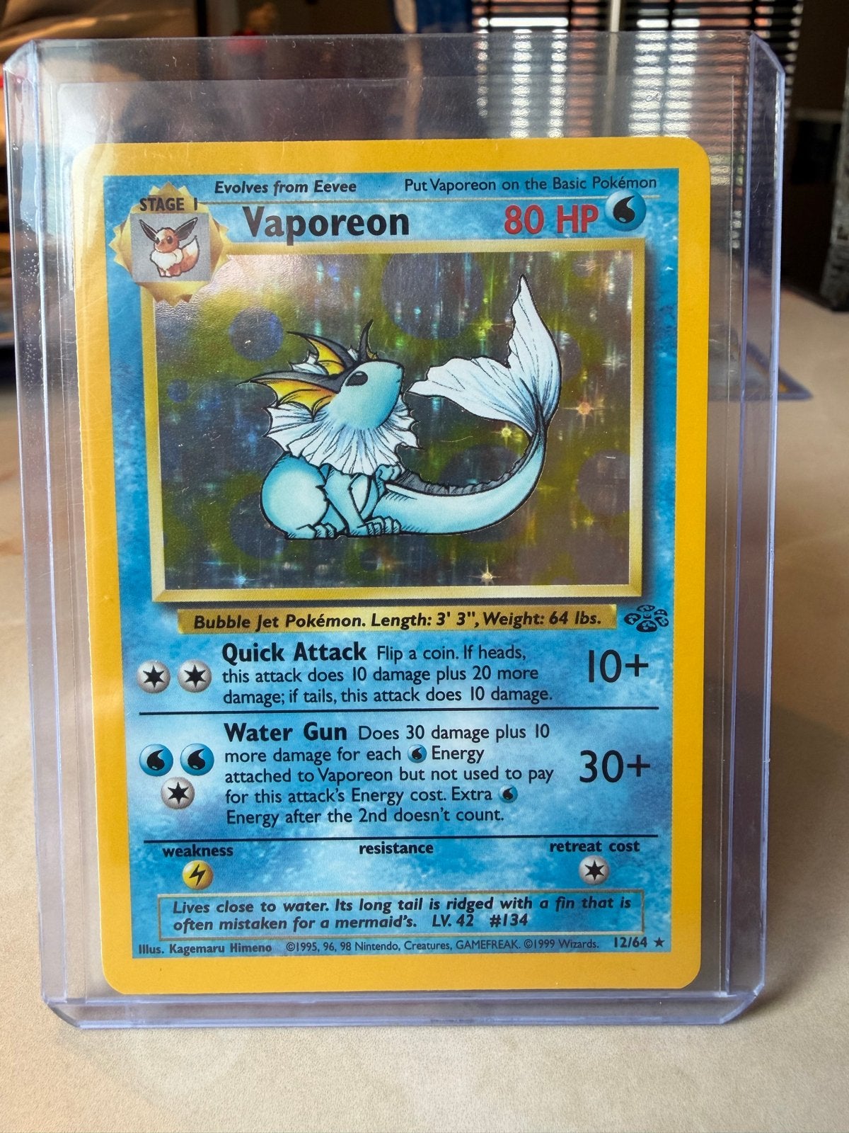 Vaporeon Holo Jungle Set 12/64 Pokémon Kaart (1999), Ophalen of Verzenden, Zo goed als nieuw, Losse kaart, Foil