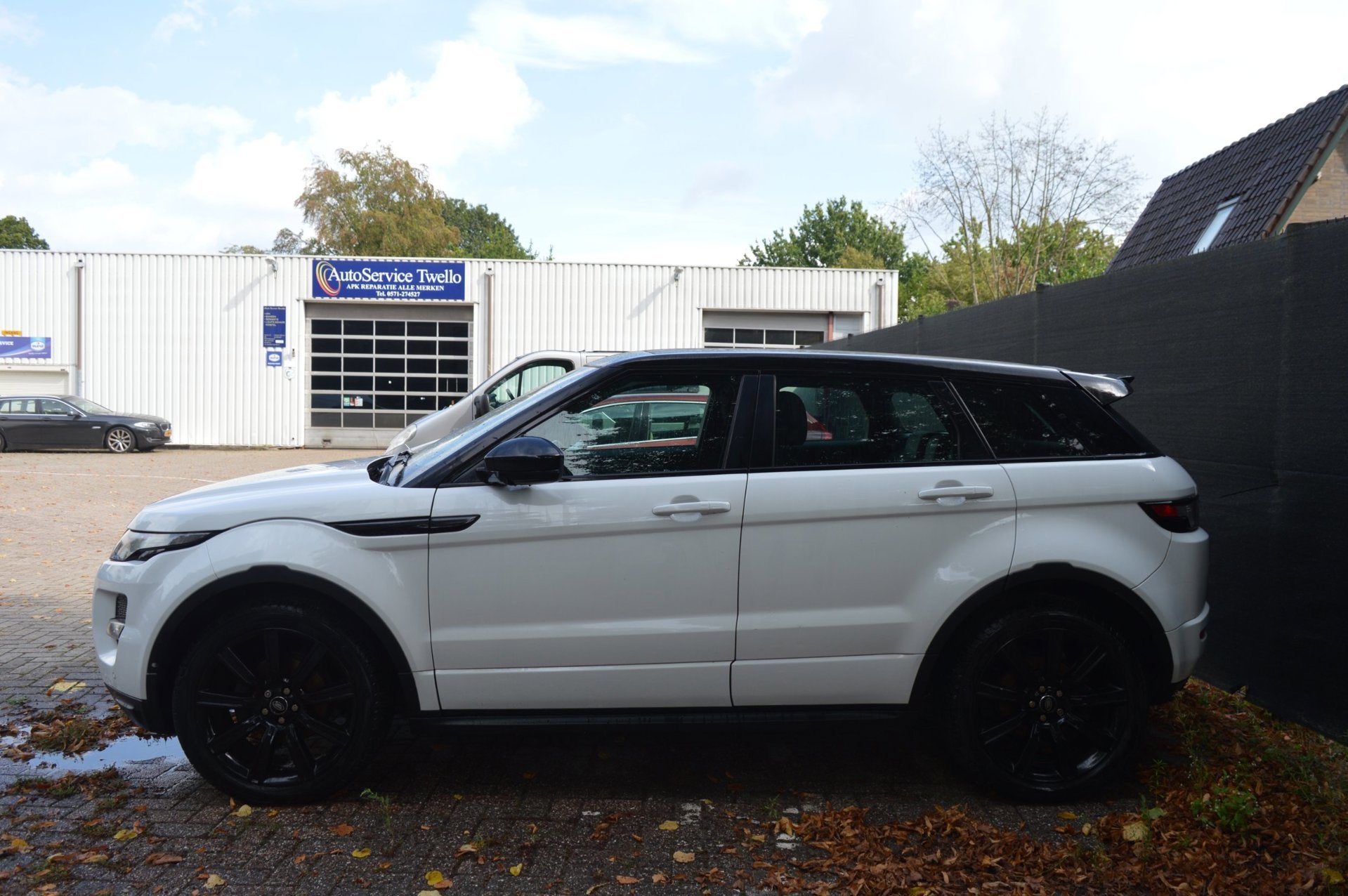 Land Rover Range Rover Evoque 2.0 Si 4WD Prestige/EXPORT/MOT, Auto's, Euro 5, Zwart, 4 cilinders, Wit