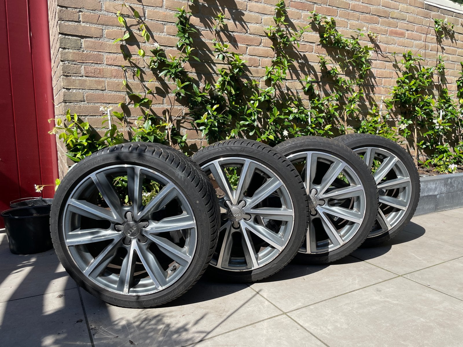 Orginele Audi 17 inch velgen + Bridgestone all-season banden, Ophalen, Banden en Velgen, 17 inch, All Season