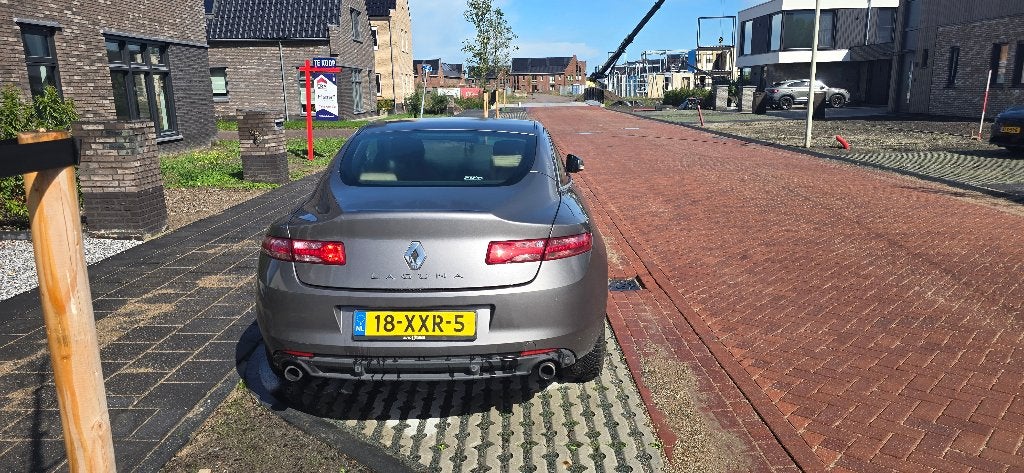 Renault Laguna 2.0 16V T170 Coupe Aut6 2012 Grijs, Auto's, Beige, 4 cilinders, 4 stoelen, 650 kg