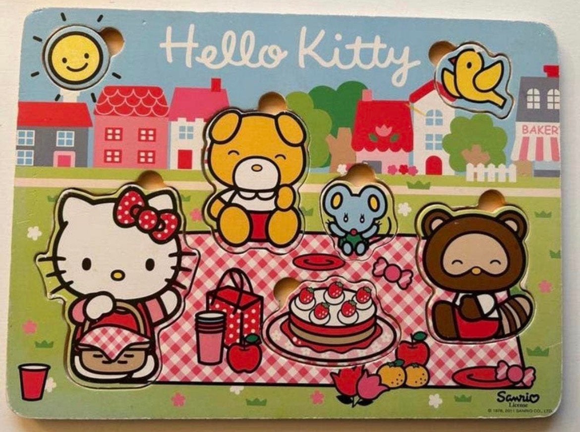Hello Kitty houten puzzel - Picknick thema, Kinderen en Baby's, Ophalen of Verzenden, Zo goed als nieuw, Van hout, Minder dan 10 stukjes