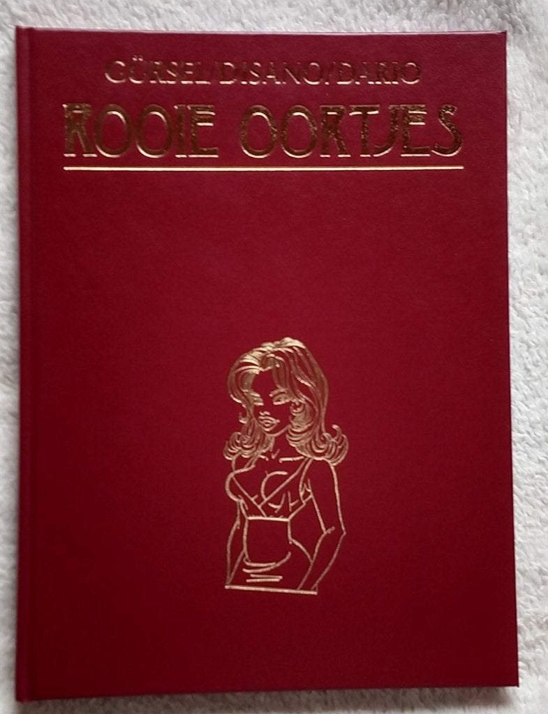 rooie oortjes hardcover, Gürsel Disano Dario, volgnr 16, Boeken, Stripboeken, Eén stripboek, Ophalen of Verzenden, Zo goed als nieuw