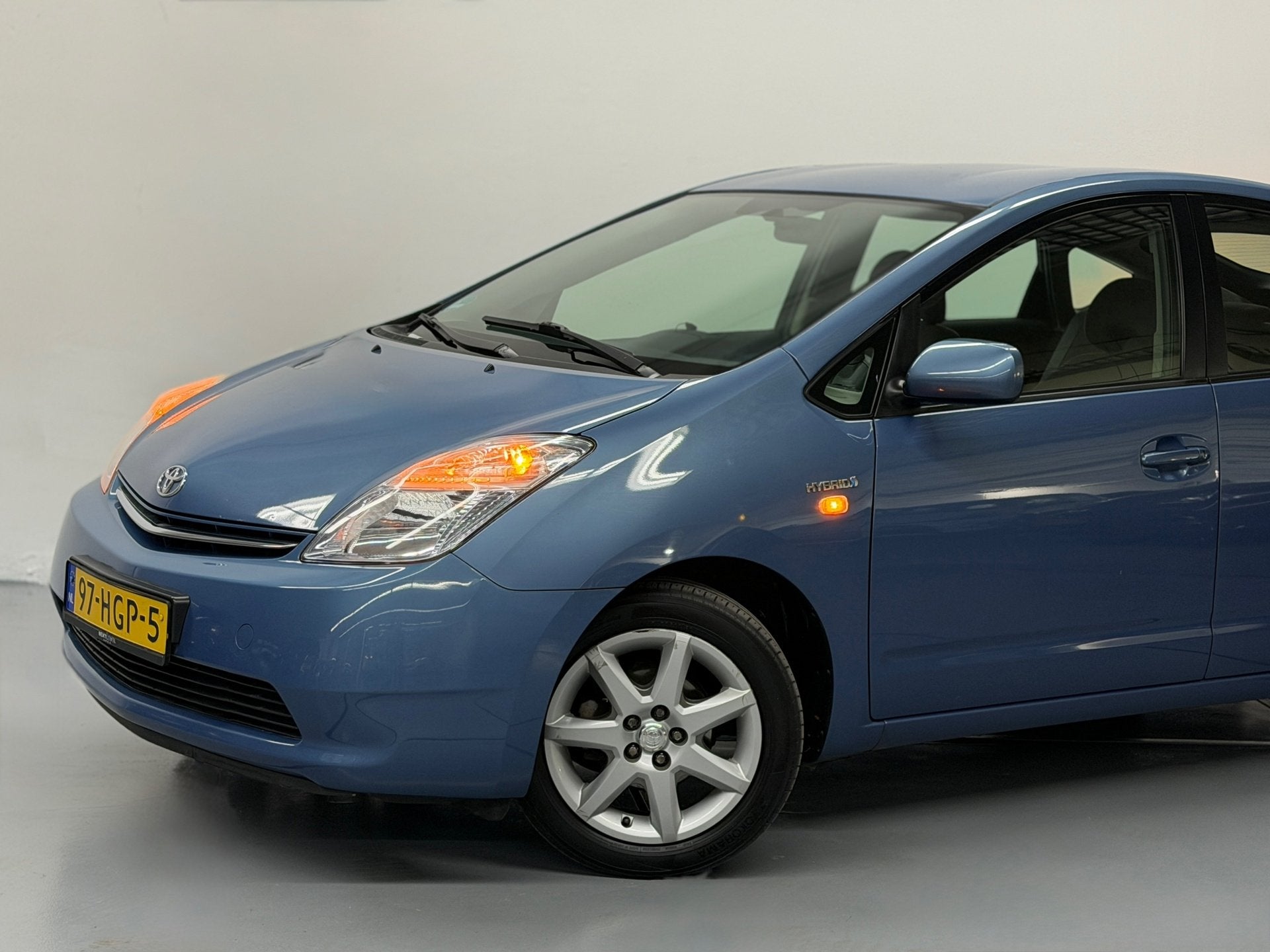 Toyota Prius 1.5 VVT-i Comfort Hybride Airco 1.Eigenaar Crui, Auto's, Dealer onderhouden, Gebruikt, Zwart, 4 cilinders